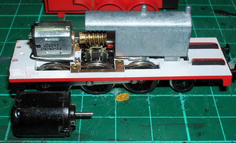 Side view of the new motor glued in place and wired up.